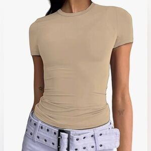 NWT Abardsion Double lined Peach color tight Top Size M